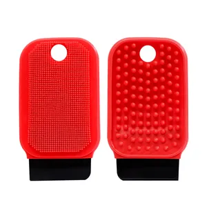 Versatile red silicone fruit and vegetable brush with integrated scraper for kitchen cleaning