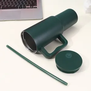 Detail view of 40oz dark green insulated stainless steel tumbler with lid and straw