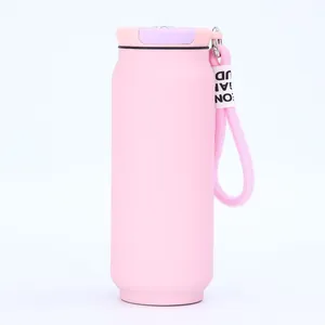Detailed macro view of a pink can-shaped vacuum flask with a soft braided strap.