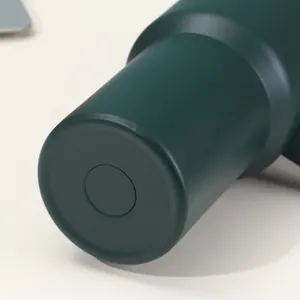 Close-up detail of the dark green matte bottom on a 40oz insulated stainless steel tumbler