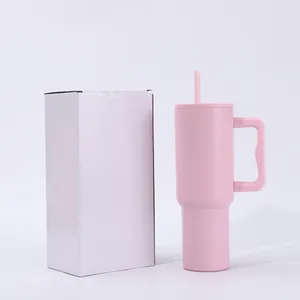 Pink 40oz stainless steel insulated tumbler with handle shown with white packaging box