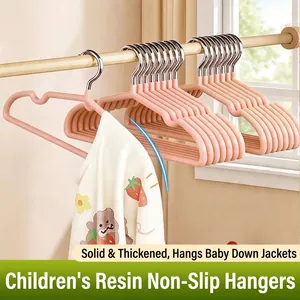 Durable pink non-slip thickened resin clothes hangers for kids and baby outfits.