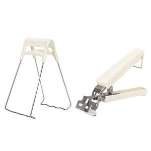 Anti-scald bowl and plate gripper set, stainless steel kitchen tools on white background.