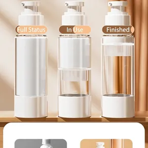 Professional set of three white vacuum pump bottles for travel lotions and cosmetic creams