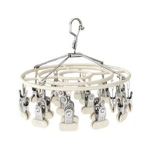 Multipurpose circular stainless steel laundry drying rack with 20 clips for socks.