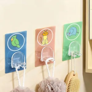 Colorful cartoon wall-mounted toothbrush holders with cute animal prints and dual hooks.