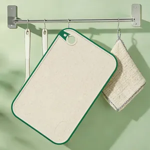 Antibacterial kitchen cutting board with green border and hanging hole for fruits and vegetables