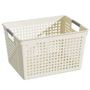 Panier de rangement en plastique beige perforé avec poignées grises pour la maison