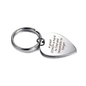 Stainless steel heart keychain engraved with A great COACH is hard to find and impossible to forget