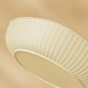 Modern cream fluted fruit bowl with luxury texture for living room coffee table decor.