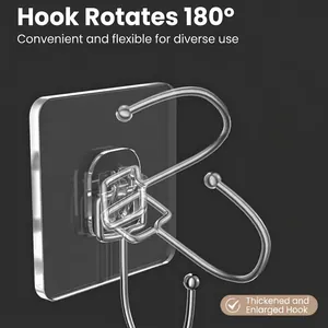 Heavy duty stainless steel adhesive hook with 180-degree rotation for dormitory walls.