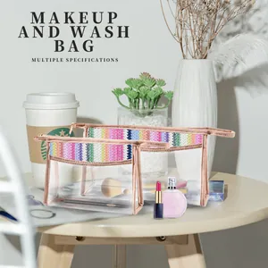 Detail view of rainbow woven PVC makeup bag showing transparent texture and colorful embroidery