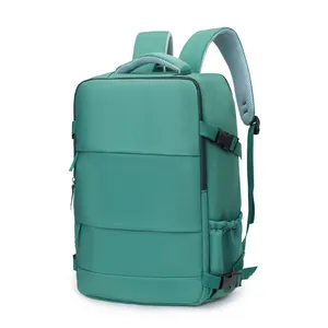 Detailed view of the teal travel backpack showing adjustable buckles and straps