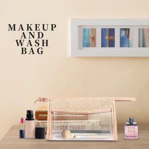 Woven pink trim makeup bag with clear PVC window displayed with beauty accessories.