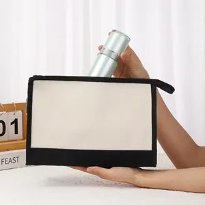 Vue détaillée de la trousse à maquillage en toile contrastée avec fermeture éclair