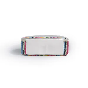 Detailed bottom view of a rainbow woven straw and transparent PVC waterproof makeup bag