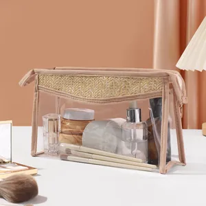 Close-up of straw woven and transparent PVC makeup bag showing storage capacity