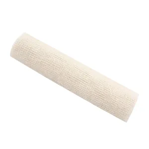 Rouleau de tapis antidérapant en maille crème pour fixer les draps et coussins de canapé