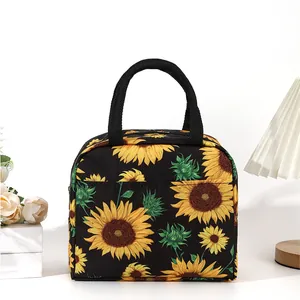 Vue détaillée du sac à lunch isotherme avec imprimé tournesols éclatants et décor