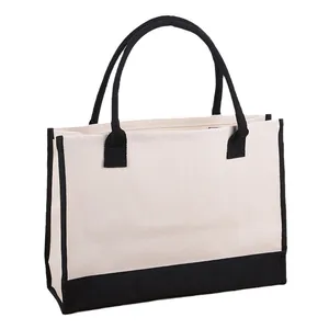 Spacious beige canvas tote bag with black handles and base for women's daily shopping