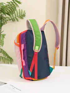Side view of dopamine color block waterproof nylon backpack with wide straps.