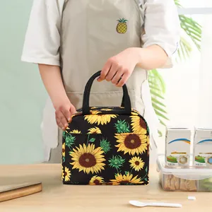 Sac à lunch isotherme portatif avec imprimé tournesol vibrant dans un décor de cuisine