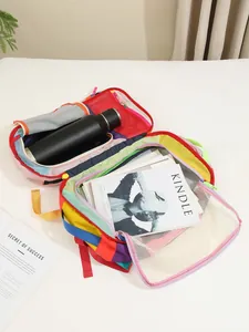 Internal view of colorful contrast nylon backpack showing compartments and capacity