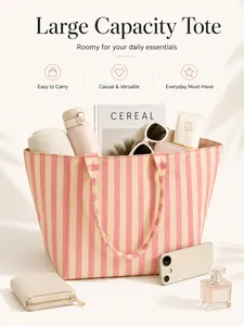 Spacious pink and cream striped canvas beach tote bag packed with daily lifestyle essentials