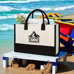 Bolso tote de lona con frase de paternidad en detalle