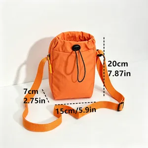 Detailed dimensions for orange lightweight nylon drawstring crossbody phone bag with strap