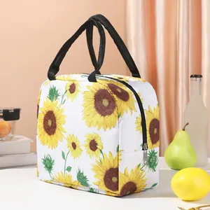 Gros plan sur le motif tournesol de ce sac à lunch isotherme portable en tissu imprimé