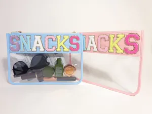 Transparent PVC storage bag with colorful embroidered SNACKS letters for travel makeup