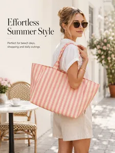Stylish pink and cream striped canvas tote bag for summer beach outings and shopping.