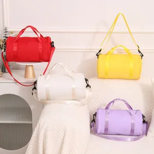 Colorful waterproof cylindrical gym bags for yoga and dance in a cozy indoor setting