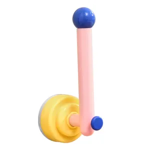 Colorful rotating wall-mounted suction cup hook for organizing hair ties and headbands