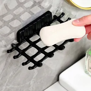 Wall-mounted minimalist black rattan-style soap dish with nail-free adhesive for bathroom