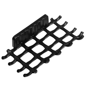 Wall-mounted black plastic soap dish with grid drainage rack for bathroom and shower area