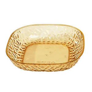 Amber translucent food-grade bone scrap plate with decorative diamond pattern texture.