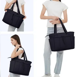 Large quilted tote bag with multi-compartments for women shown on model from various angles