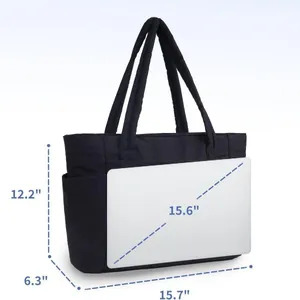 Large black quilted tote bag showing 15.6 inch laptop capacity and product dimensions