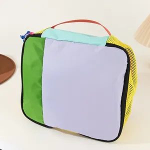 Vibrant multi-color dopamine style nylon travel storage bag with mesh detail and red handle
