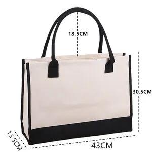Vue détaillée des dimensions d'un sac fourre-tout en toile bicolore avec mesures de taille