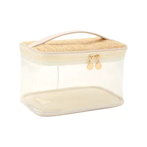 Close-up detail of large capacity transparent PVC toiletry bag featuring a woven straw lid