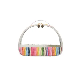 Semi-circle transparent PVC cosmetic bag with rainbow woven straw base and gold zippers