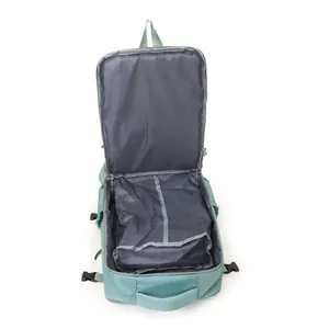 Detailed view of the large open main compartment of a light blue travel backpack