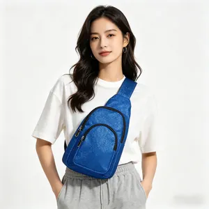 Glitter blue crossbody chest bag worn by a female model in a casual sporty outfit.