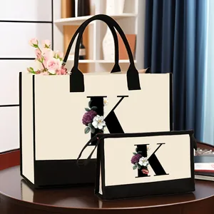Ensemble de sac cabas et trousse en toile avec impression lettre K fleurie élégante
