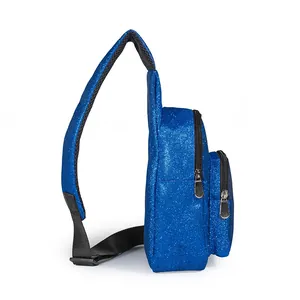 Detailed side profile of blue glitter crossbody chest bag showing zippers and strap