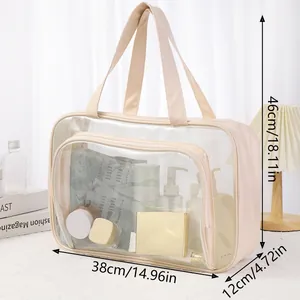 Detail view of large transparent toiletry bag with 38x12x46cm dimension guide