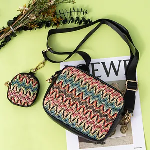 Detail shot of a bohemian woven crossbody bag with matching round coin purse